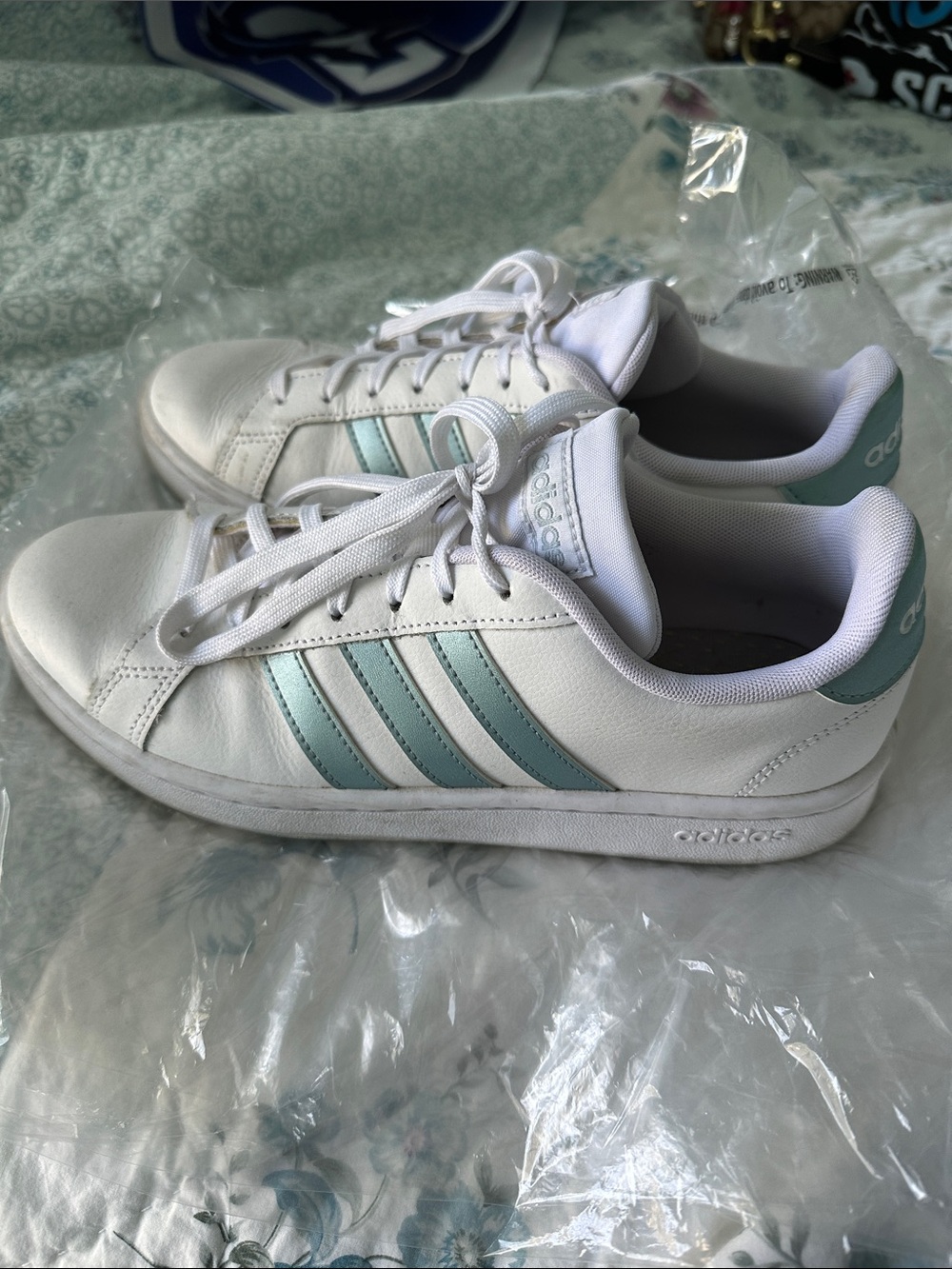 Adidas Women’s White Sneakers with Light Teal Stripes